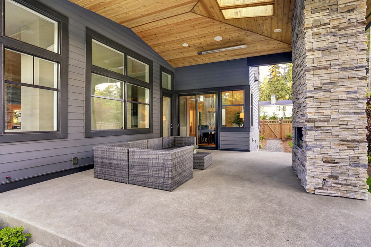 A beautiful porch design with concrete natural patio in Seattle, WA